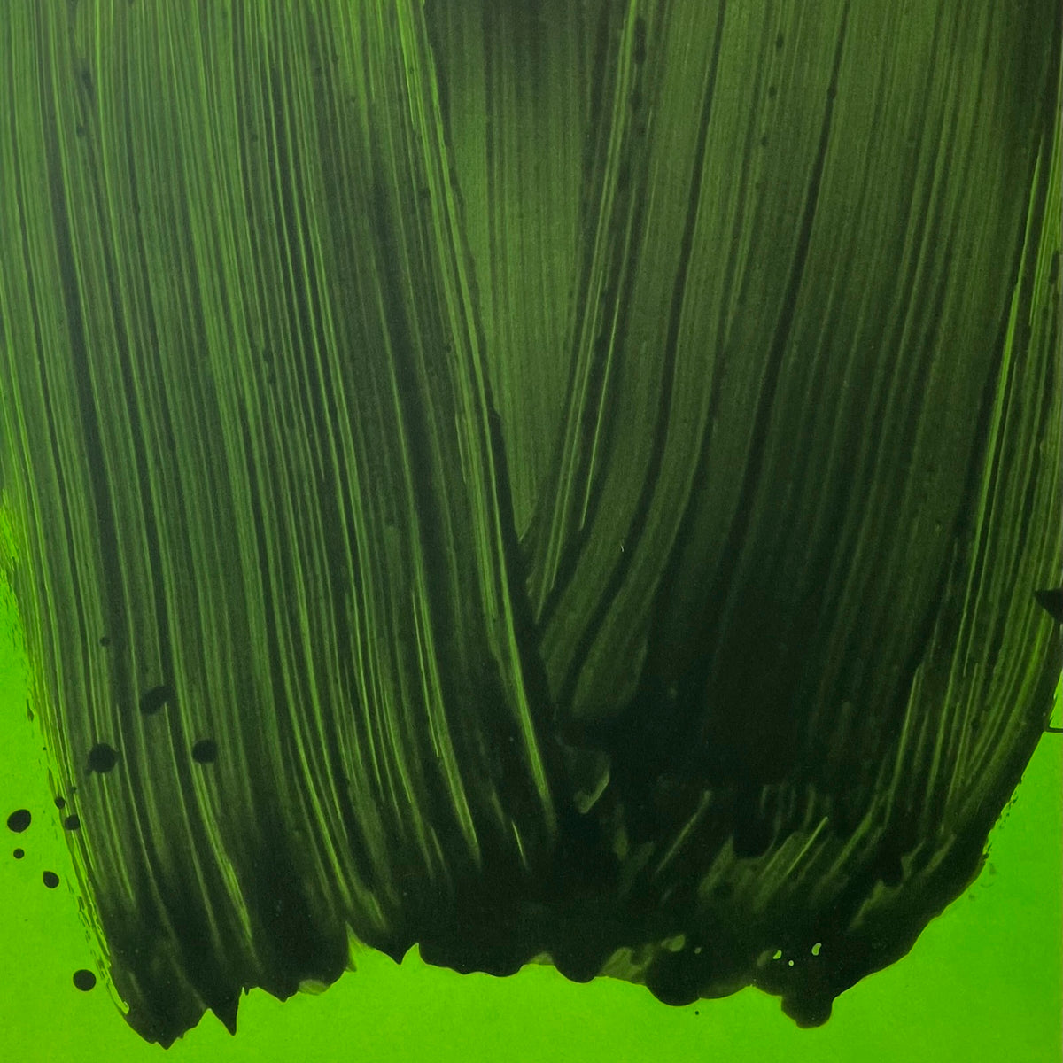 Detail from Ruth Campau's 'This Moment for You' monoprint: fluid black abstract brushstroke over a vibrant, bright green background.